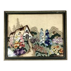 a painting with flowers and a house in the background