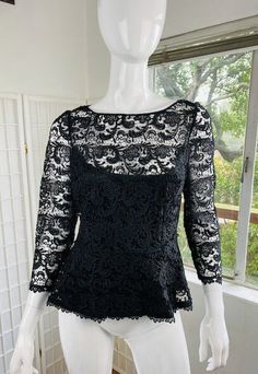 mannequin 4 Vintage Carmen Marc Valvo black lace top with camisole, 8. Good condition. Size; 8 Fitted Lace Bodice For Evening, Chic Black Top With Scalloped Lace, Elegant Black Top With Scalloped Lace, Elegant Black Tops With Scalloped Lace, Elegant Black Scalloped Lace Top, Spring Evening Top With Scalloped Lace, Long Sleeve Tops With Scalloped Lace For Evening, Scalloped Lace Fitted Top For Night Out, Evening Tops With Scalloped Lace For Spring