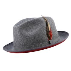 Step into a bygone era of style with the Vintage Vogue Collection's Montique Grey Wool Felt Dress Hat, featuring a dramatic red bottom. This handsome two-tone hat combines old-world charm with modern flair, making it a standout accessory for any gentleman's wardrobe. Crafted from high-quality wool felt and adorned with a tasteful felt band, this hat not only looks good but feels great without lining, ensuring lightweight comfort throughout the day.  The 2 ¼" brim offers both sun protection and a Classic Red Hat For Fall, Fitted Hat With Short Brim And Lining, Vintage Fitted Fedora For Fall, Classic Red Fall Hat, Fitted Vintage Fedora For Fall, Red Fitted Fedora For Kentucky Derby, Classic Fitted Cloche Hat Bands, Red Fitted Hat For Costume, Elegant Red Fedora For Fall