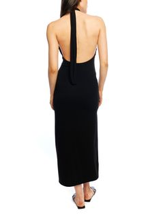 Tie back, halter mock neck Midi length Side slit Open back Figure hugging Fabric: 65% Polyester, 26% Spandex, 9% Rayon Care: Hand was cold. Do not bleach. Line dry. Iron low heat. Halter Midi Dress, Leather Dresses, Festival Wear, Tie Backs, Top Dress, Tie Back, Sweater Jacket, The Label, Midi Length