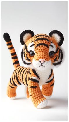 a crocheted stuffed animal that looks like a tiger