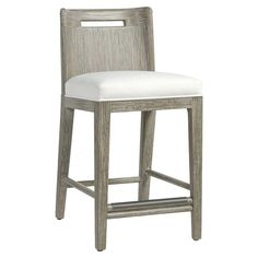 a gray and white bar stool with an upholstered seat on the backrest