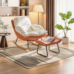 a living room with a chair and ottoman