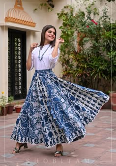 "Item: Skirt for women ( Shirt and kids wear are available for purchase seperately) The made in heaven combination of white and blues, makes way in our 'Rang' collection. Kalidaar Lehengas often made with alternating print panels are a common North Western design theme! Made with the combination of four different Indigo prints, with multi-tiered cone latkans hanging on the side. The ghera of the skirt has a trimmed crotchet lace. Additional Information: Fabric: Cotton Length of Skirt: 38\" Ghera Cotton Skirts Indian, Long Skirt Outfits Indian, Skirt And Top Indian, Cotton Skirt Outfit, Blue Skirt Outfits, Blue Cotton Skirt, Printed Skirt Outfit, Long Cotton Skirt, Long Skirt And Top