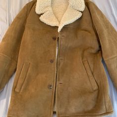 Men's Brooks Brothers Leather Shearling Jacket, Tan/Light Brown Exterior, Size Large, Like-New Condition. Continental Us Sales Only, No Alaska Nor Hawaii. No Returns. Shipping Will Be By Ups Ground 2-Day With Insurance Included Given The Value Of The Item. Classic Winter Outerwear With Suede Lining, Luxury Winter Outerwear With Suede Lining, Classic Lambswool Outerwear For Winter, Classic Sheepskin Outerwear With Fleece Lining, Classic Sheepskin Outerwear For Cold Weather, Leather Shearling Jacket, Shearling Leather Jacket, Shearling Jacket, Brooks Brothers