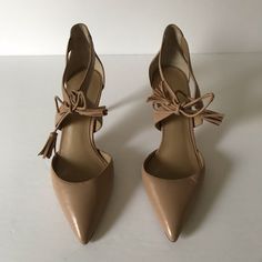 Leather Pumps In Maple Blush Color. Size 7 1/2. Style 428903 New, Never Worn. No Box Please Note, There Is A Small Dent On The Front Of The Left Shoe. Shown In Last Picture. Spring Leather Heels With Tassels, Leather Heels With Tassels, Chic Ankle Strap Heels With Tassels, Spring High Heel Shoes With Tassels, Spring High Heels With Tassels, Leather Tassel Heels For Party, Elegant Leather Heels With Tassels, Party Leather Heels With Tassels, Chic Leather Heels With Tassels