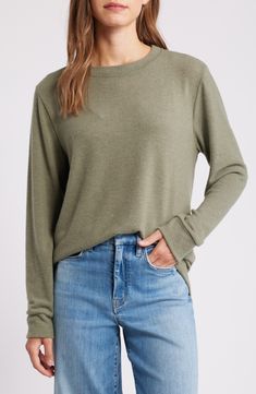 Cozy up for casual hangouts in this brushed jersey pullover that's destined to become a weekend-wardrobe favorite. 26 1/2" length Crewneck Long sleeves 78% polyester, 18% rayon, 4% spandex Machine wash, dry flat Imported Weekend Wardrobe, Nordstrom Store, Jersey Top, Top Brands, Top Blouse, Nordstrom, Long Sleeves, Womens Tops, Spandex