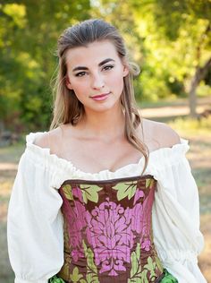 "Victorian Steel Boned Corset: Pink and Green The perfect corset for ladies fair, this pink and green brings to mind bright spring days. As we all know, from the beautifical Galinda, \"Pink goes good with green!\" This lovely pink and green corset is paired with a pink fancy saloon skirt, a green steampunk skirt, and a white cotton chemise. This is a fully boned Victorian over bust corset. I designed this corset to give classic curves and a feminine hourglass shape. My corsets are made with top Medieval Corset Dress For Festival, Steampunk Corset Belt For Fantasy Events, Medieval Corset Dress For Larp, Bohemian Corset For Festivals, Bohemian Fitted Corset Dress, Medieval Style Corset For Larp, Bohemian Corset Dress For Costume Party, Bohemian Fitted Corset Dress For Costume Party, Bohemian Fitted Corset Dress For Costume