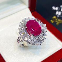 IN-STOCK READY OR SHIPPING! Free UPS EXPRESS SHIPPING! EXTREMELY GORGEOUS AND RARE CERTIFIED NO-GLASS-FILLING, GENTLE HEAT ONLY, RARE, VIVID RED RUBY RING. Extremely rare signature VIVID RED, EXTREMELY BEAUTIFUL! RARE quality, BURMESE RUBY. With numerous brilliant round, F/VS diamonds. Set in a LUXURIOUS DESIGNED, 18K solid white gold ring!! One of a kind! ONE OF A KIND! WHAT YOU SEE IN THE PICTURES IS THE EXACT RING YOU WILL GET NO DUPLICATES!! SUGGESTED RETAIL PRICE: $9,500 RUBY: Weight: 3.58 White Ruby Ring With Halo Setting For Wedding, Luxury Platinum Ruby Wedding Ring, White Gold Diamond Ruby Ring For Wedding, White Gold Ruby Ring With Diamonds For Wedding, Dazzling White Gold Ruby Ring For Wedding, Elegant Gia Certified Ruby Ring For Wedding, Elegant Gia Certified Ruby Wedding Ring, Luxury Ruby Ring With Diamond Cut For Wedding, Luxury Diamond Cut Ruby Ring For Wedding