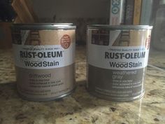 two cans of rustoleum sitting on top of a counter