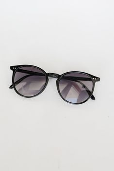 Sunny days just wouldn't be the same without an essential accessory like the Perfectly Iconic Black Round Sunglasses! These essential summer sunglasses have a round shape with black frames! Save your eyes the strain and harmful rays with a pair of sunglasses that never compromise style or function. Round Shape Black Frames One Size | Frame Length 5.5" | Height 1.75" | Temple Arm Length 5.25" Black Cat Eye Sunglasses With Uv Protection For Vacation, Summer Matte Black Mirrored Cat Eye Sunglasses, Matte Black Sunglasses For Everyday Summer Use, Summer Matte Black Cat Eye Sunglasses With Tinted Lenses, Casual Black Plastic Aviator Sunglasses, Black Aviator Sunglasses With Gradient Lenses For Vacation, Black Plastic Cat Eye Sunglasses For The Beach, Black Plastic Cat Eye Sunglasses For Beach, Round Sunglasses With Gradient Lenses For Everyday