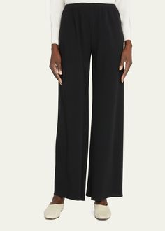 "Find THE ROW Gala Wide-leg Crepe Pants on Editorialist. THE ROW \"Gala\" crepe pants. High rise. Elastic waistband. Flat front. Wide legs. Pullon style. Triacetate/polyester. Dry clean. Made in Italy." Elegant Wide-leg Pants With 4-way Stretch, Evening Wide-leg Pants With Elastic Waistband, Evening Straight Pants With Elastic Waistband, Elegant Stretch Wide Leg Pants With Elastic Waistband, Versatile High-waisted Pants For Evening, Elegant Stretch Pants With Elastic Waistband, 4-way Stretch Wide Leg Trousers With Elastic Waistband, Versatile Straight Pants For Evening, Evening Wide Leg Trousers With Elastic Waistband