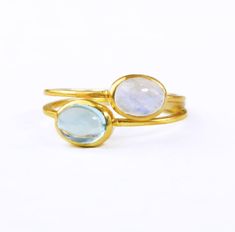 You'll love these stackable oval gemstone rings of your choice. Rings are bezel set with a rounded, shining cabochon finish to the stones. Available in bright sterling silver, 18k vermeil rose gold or 18k vermeil yellow gold. Gemstone are approximately 5 mm x 7 mm in size.Open back setting. Band stamped with 925 on inside.METAL 18K VERMEIL GOLD 18K VERMEIL ROSE GOLD BRIGHT STERLING SILVER Ring will be shipped in Danique Jewelry gift box.💍CREATE YOUR OWN RING SET!💍Contact us for your own custom Oval Gemstone Gold Stackable Rings, Gold Oval Stackable Birthstone Ring, Gold Oval Birthstone Stackable Ring, Gold Oval Cabochon Birthstone Ring, Oval Stackable Birthstone Ring In Fine Jewelry Style, Handmade Oval Yellow Gold Stackable Rings, Oval Birthstone Stackable Ring In Fine Jewelry Style, Gold Oval Cabochon Birthstone Ring With Bezel Setting, Adjustable Stackable Oval Birthstone Ring