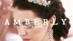 a woman wearing a tiara and earrings with the words amberly behind her head