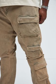 Available In Taupe. 5 Pocket Body Stacked Skinny Flare Fit Zip Fly Button Closure Cargo Square Pockets Open Hem Disclaimer: Due To The Distressing Process, Each Garment Is Unique. Disclaimer: To Keep The Aesthetic Of This Garment, Please Follow The Care Instructions Carefully. 88% Cotton, 8% Polyester, 4% Spandex Imported | Mens Three Cargo Stacked Skinny Flare Jeans in Taupe size 30 by Fashion Nova Taupe Fashion, Flare Jeans, Fashion Nova, Mens Jeans, Care Instructions, Spandex, Square