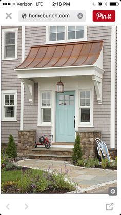 a house with a motorcycle parked in front of it