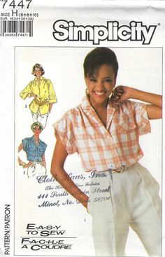 a woman wearing white pants and a plaid shirt in front of an advertisement for simply