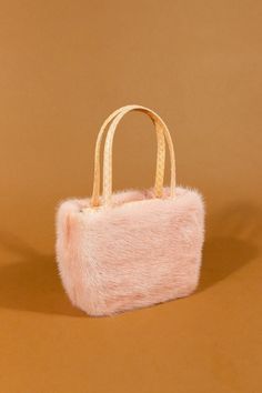 "Rene Caovilla fluffy pink mink fur handbag. Pink snakeskin accents and handles, silver-tone hardware, leather base, tonal woven lining and snap closure at interior flap. Comes with original dust bag. Excellent like-new condition. measurements  length: 7.5\" width: 3.5\" height: 5.25\" opening: 6.5\" x 1.5\" As these items are previously owned, we do not accept returns" Luxury Evening Bags In Faux Fur, Luxury Faux Fur Evening Bag, Rectangular Faux Fur Evening Bag, Elegant Rectangular Shoulder Bag With Faux Fur Lining, Elegant Rectangular Faux Fur Bag, Elegant Faux Fur Bags, Evening Rectangular Bag With Faux Fur Lining, Luxury Faux Fur Rectangular Shoulder Bag, Luxury Rectangular Faux Fur Shoulder Bag