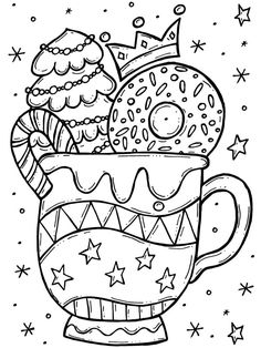 a cup filled with doughnuts and sprinkles on top of it