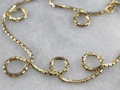 This classic box chain necklace is crafted from highly polished gold. Each link creates a fluid play of light that almost seems to sparkle when worn. This is a versatile piece that would look lovely worn alone or strung with a pendant. Metal: 14K Yellow Gold Width of Chain: 1.6 mm Length of Chain: 15 Inches Marks: "585" Stamped on the clasp Chain Layering, Box Chain Necklace, Gold Box, Layering Necklace, Chain Pendant, Box Chain, Chain Pendants, New Hampshire, Infinity Bracelet