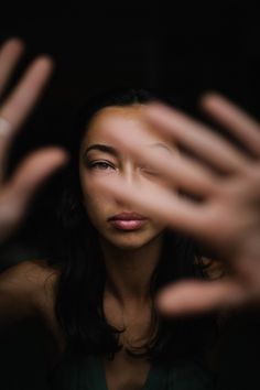 a woman with her hands in the air