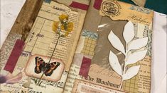 an altered book with butterflies and music notes