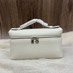 Color: Off-White, Black, Light Gray, Gray Outer 100% full grain leather Vegan Leather Lining One main compartment Silver-tone hardware Measurement:  W19cm, D6cm, H 11cm (7*2*4") Top Handle Bags, Women Leather, Leather Pouch, Leather Clutch, Black Light, Full Grain Leather, Evening Bags, Light Gray, Purses And Handbags