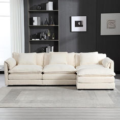 a living room with a large white couch