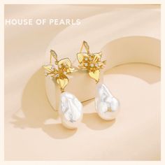 Just in! This unique Floral Baroque Pearl Drop Earrings for $99.00. #realpearls #tahitianpearls #houseofpearlsoffical #pearlshell #jewelrygram #freshwaterpearls #pearls #PearlJewellery #vintagejewelrylovers #motherofpearls#houseofpearlsoffical Luxury Pear-shaped Teardrop Earrings For Wedding, Elegant Baroque Pearl Earrings, Luxury Pearl Wedding Earrings, Elegant Cubic Zirconia Flower Bridal Earrings, Elegant Baroque Earrings For Formal Occasions, Elegant Baroque Pearl Earrings For Party, Luxury Baroque Pearl Earrings For Wedding, Elegant Formal Pearl Earrings With Flower Shape, Elegant Flower-shaped Pearl Earrings For Formal Occasions