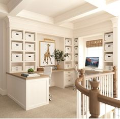 a home office with shelves, desk and computer on the far wall in front of it