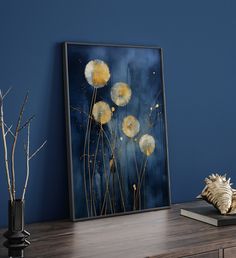 Unframed Blue and Gold Dandelion Wall Art Print  (Please note: Colours may vary slightly from those displayed on your screen) ABOUT THE PRINT Our high quality wall art prints are an excellent way to enhance the visual appeal of any room. They are made with premium materials and state-of-the-art printing technology to ensure sharp details, vivid colors, and a long-lasting finish. These prints come in a variety of styles, from modern and abstract to traditional and classic, making it easy to find one that fits your decor. They are also available in different sizes, allowing you to choose the perfect fit for your wall space. High quality wall art prints are an investment in your home's decor, providing an eye-catching focal point that will endure for years to come. Whether you're looking to c Navy And Gold Wall Art, Navy Blue And Gold Art, Blue Gold Artwork, Indigo Gold Art, Dandilion Wall Art, Dandelion Wall Art, Gold Art Painting, Romantic Gestures, Unframed Wall Art