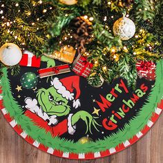 a christmas tree skirt with the grin on it