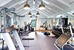 an indoor gym with treadmills and exercise equipment