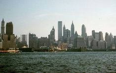 a large body of water with lots of buildings in the background