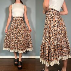 Stunning 70s brown floral prairie skirt with lace trim!  Size Small Brand - Lori Ann / Union Made Era - 70s Great Vintage Condition (FLAW - some very minor fraying on the lace) Made in Canada Measurements LAYING FLAT Waist - 12.5" Hips - 21" Length - 31" Please let me know if you have any questions! Vintage Brown Flowy Skirt, Vintage Brown Skirted Bottoms, Vintage Brown Tiered Skirt, Brown Vintage Tiered Skirt, Vintage Long Skirt With Lace Trim, Vintage Floral Print Tiered Skirt, Vintage Tiered Skirt With Floral Print, Vintage Cotton Brown Skirt, Vintage Lace Trim Skirt For Summer