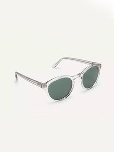 When you usually go for round frames but want an extra edge. Meet the Lich, a classic circular design with an angled brow line to keep things interesting without straying too far from the path. The best of both worlds. In a transparent smoke grey bio-acetate with bottle green Grilamid lenses. Pala sunglasses give 100% UVA/UVB protection and can be used with prescription lenses through your local optician. Each frame comes with a soft microfiber bag to protect and clean you lenses and a sustainab The Lich, Transparent Sunglasses, Recycled Plastic Bags, Circular Frame, Round Frames, Circular Design, Eyewear Brand, Bottle Green, Give Back