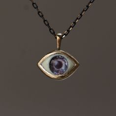 Depth Of Blue Eye Necklace, Eye Of Luck, Minimalist Blue Eye Pendant, Evil Eye Talisman, Third Eye Necklace, 925K Silver Pendant, Gift Idea My eye designs can be made specifically for your eyes, you need to take a beautiful iris photo for us. Then we can customize it for you. You can also add or remove blood details to our eye designs. You can write this in the order notes. Please send me a message after ordering. I can do as you wish. A quasi-universal symbol of protection, the evil eye is refe Creepy Eye Necklace, Blue Eye Necklace, Eyes Necklace, Eye Designs, Luxury Jewelry Box, Eye Pendant, Blue Eye, Jewel Box, Necklace Blue