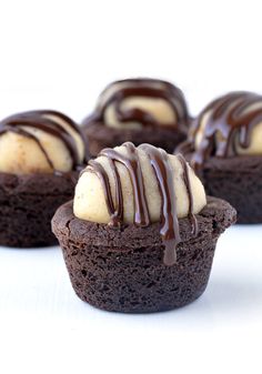 chocolate cupcakes with white frosting and drizzled bananas