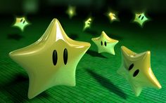 three star shaped balloons with faces and eyes are floating in the air on a green tile floor