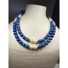 A vintage long strand of marbelized blue beads with sets of two intermittent faux pearls creates a versatile accessory that can be worn long or wrapped to appear as a double strand. The marbelized blue beads give a unique and eye-catching appearance, resembling swirling patterns of blue hues. The faux pearls add a touch of elegance and sophistication, providing a subtle contrast to the vibrant blue beads. This necklace is a perfect accessory to elevate any outfit, whether it's for a casual or formal occasion. It offers versatility in styling, allowing you to experiment with different lengths and layering options. The combination of the marbelized beads and faux pearls creates a harmonious blend of textures and colors, adding visual interest and a sense of refinement to your ensemble. Size: Swirl Pattern, Vintage Avon, Vintage Jewels, Vibrant Blue, Glass Bead Necklace, Jewel Tones, Vintage Costume Jewelry, Strand Necklace, Blue Beads