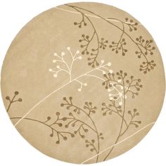 a round area rug with flowers and leaves on the inside, in neutral tones against a white background