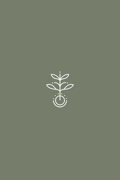 a white line drawing of a plant on a green background