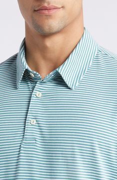 Jaunty stripes enliven a soft, comfy stretch-cotton polo knit with S-twist and Z-twist yarns for durability and shape retention. Button half placket Spread collar Short sleeves 97% cotton, 3% spandex Machine wash, tumble dry Imported Casual Striped Polo Shirt For Golf, Classic Striped Tops For Golf, Cotton Golf Tops With Contrast Stripes, Casual Golf Tops With Striped Collar, Casual Tops With Striped Collar For Golf, Casual Golf Tops With Contrast Stripes, Casual Striped Golf Tops, Striped Cotton Tops For Golf, Casual Striped Tops For Golf