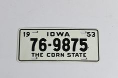 a license plate that reads iowa 76 - 8975 the corn state