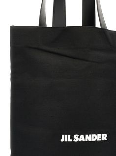 'Flat Shopper' large canvas shopping bag with leather handles, logo print. Composition: 70% cotton, 30% linen Cotton Double Handle Bag With Logo Print, Double Handle Canvas Bag With Logo Print, Canvas Bags With Logo Print And Double Handle, Designer Bags With Logo Print For Shopping, Designer Shopping Bags With Logo Print, Coated Canvas Bag With Logo For Shopping, Logo Coated Canvas Bag For Shopping, Coated Canvas Shopping Bag With Logo, Cotton Canvas Bag With Double Handle And Logo