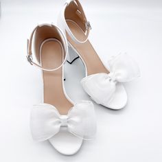 "These Classic Bow Shoe Clips can be worn on the front, back or side of most heels. Listing is for one pair. Shoes not included. *Bows need to be fluffed upon arrival. *Bows can not be worn side by side because they are too wide. - 1 pair - 5\" wide - Made in the USA SHOP MORE SHOE CLIPS, https://www.etsy.com/shop/melissavelia?section_id=24145024 *Although clips are gentle and cushioned, each shoe fabric is different. Please test out the clips on your shoes before leaving them on for a long period of time. We are not responsible for any indentation." White Sandals With 4-inch Heel For Prom, Closed Toe Heels For Summer Bridal Shower, Closed Toe Heels For Bridal Shower In Summer, Summer Bridal Shower Closed Toe Heels, White Closed Toe Sandals With Bow, White Heels With Bow And Open Heel, White Sandals With Bow And Open Heel, White Open Heel Heels With Bow, White Open Heel Sandals With Bow