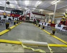 fire trucks are lined up in the garage to be used as wedding decorations and centerpieces