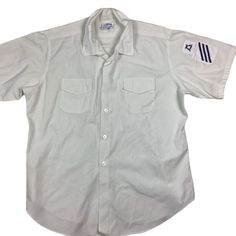 Vintage seafarer button front military uniform shirt. Measures as a large. 23 inches pit to pick, 30 inches long. High-quality. Excellent vintage condition, the tag is loose. Smoke and pet free home. 🇺🇸. White Short Sleeve Shirt With Button Cuffs, White Shirt With Pockets And Spread Collar, White Camp Shirt With Pockets And Camp Collar, White Collared Shirt With Pockets, Classic White Camp Shirt With Placket, Classic White Camp Shirt With Buttons, White Fitted Camp Shirt With Camp Collar, White Camp Shirt With Buttons, White Sailor Collar Top For Work