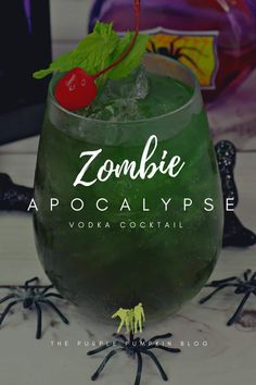 a green drink with a cherry on top and the words zombie apocaalypsee above it