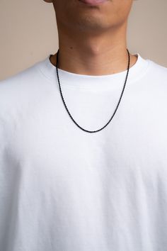 This stainless steel rope chain is made from premium quality 316L stainless steel. The steel has been plated black to give the chain a sleek and sophisticated look. The chain is durable and made for everyday wear. Stainless steel is hypoallergenic, resistant to tarnishing and waterproof! Making it perfect for those who have sensitive skin. Chain Thickness: 2 mm Length: 18", 20", 22" Clasp: Lobster Claw Materials: 316L Stainless Steel Water and Sweat Resistant Hypoallergenic Recommended length fo Everyday Black Link Chain Necklace, Black Stainless Steel Chain Necklace With Adjustable Chain, Black Adjustable Chain Necklace For Everyday, Everyday Black Box Chain Necklace, Everyday Black Adjustable Chain Necklace, Black Box Chain Link Necklace, Black Link Chain Necklace With Adjustable Chain, Black Adjustable Chain Necklace, Black Chain Necklace With Adjustable Chain